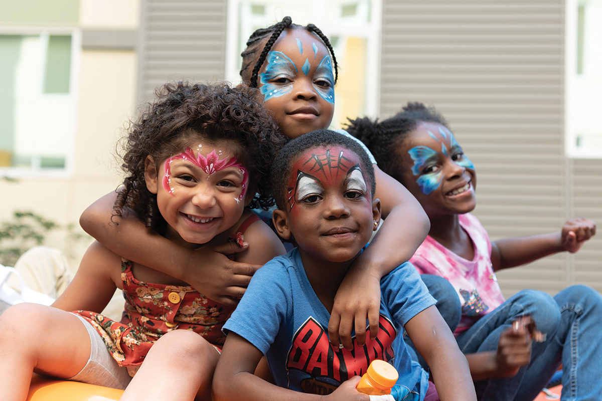 Smiling kids with face paint